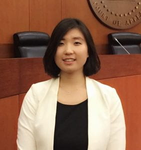 portrait of Angela Kim in professional attire