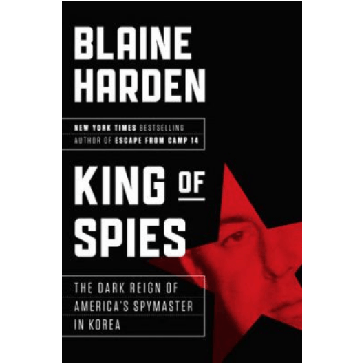book cover with red star of a person's face; text: King of Spies: The Dark Reign of America's Spymaster in Korea by Blaine Harden