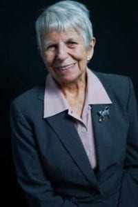 Linda Yarr, Research Professor, in professional attire