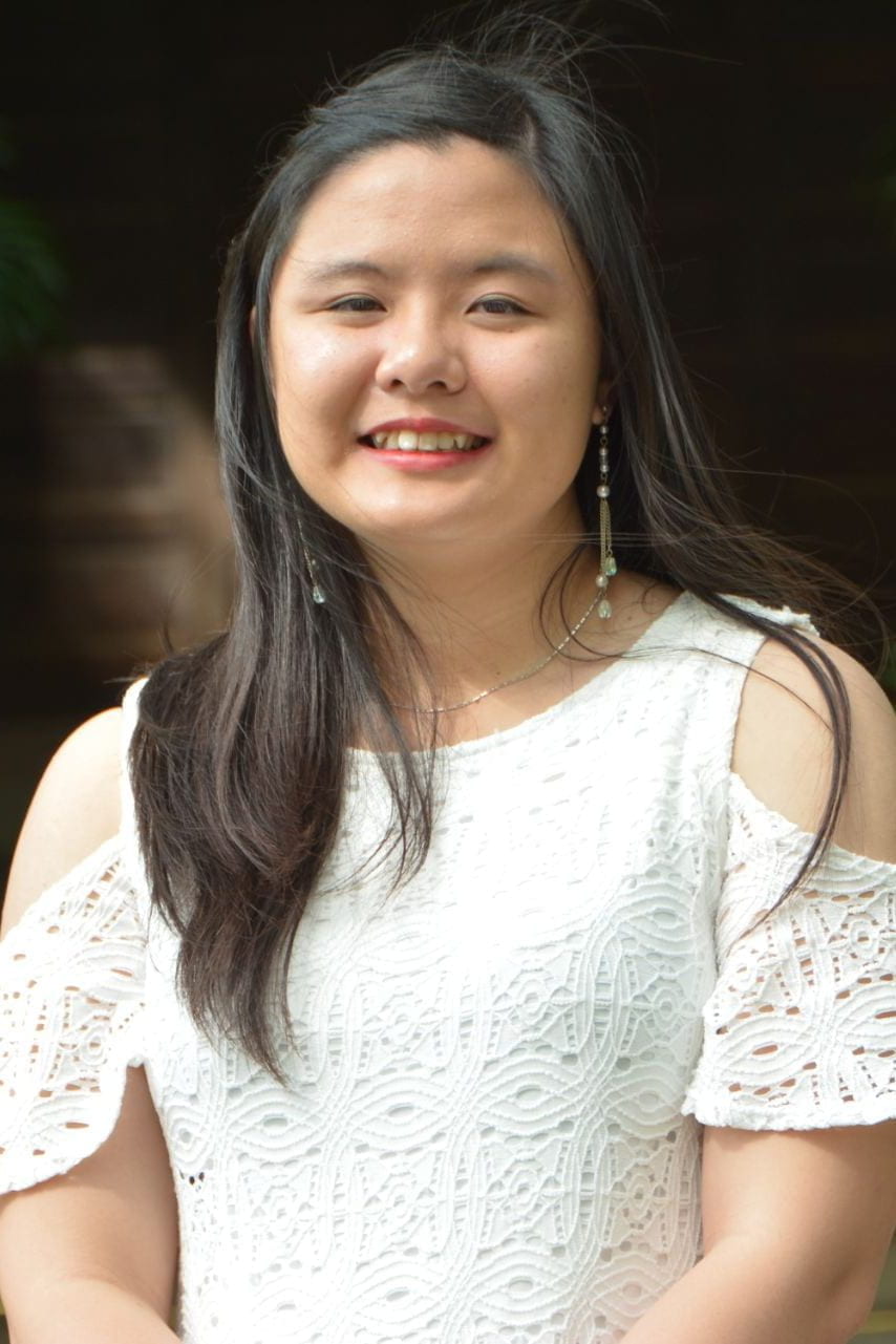 professional portrait of Jennifer Tse in white dress