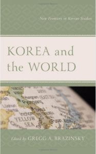 green book cover with map stock image; text: Korea and the World by Gregg Grazinsky